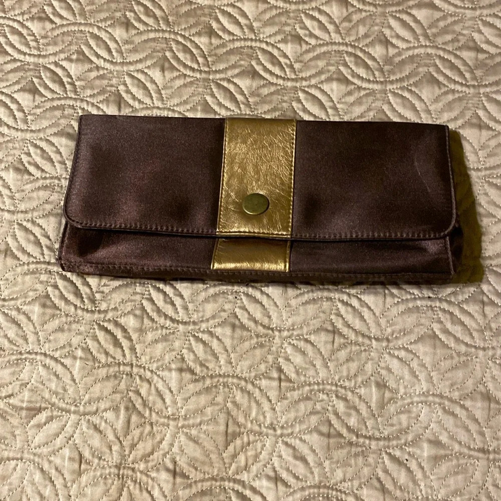 Brown and gold clutch